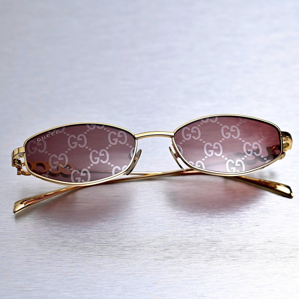 Lunettes de soleil mode serpent doré chic 9941